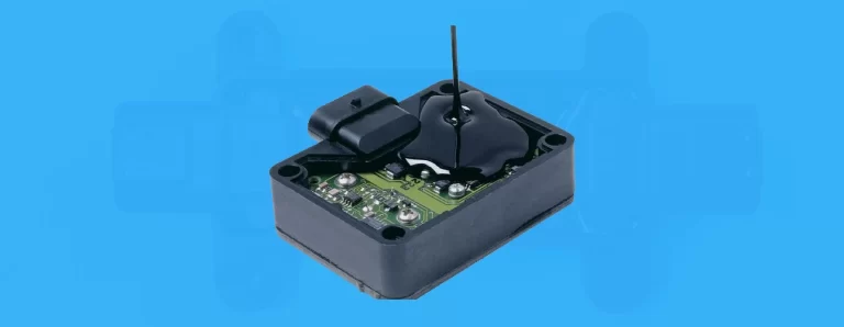 Fully encapsulated PCB module with black epoxy potting resin providing moisture, shock, and vibration protection for automotive electronics